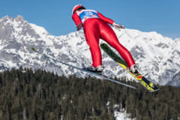 Elite ski jumper from behind